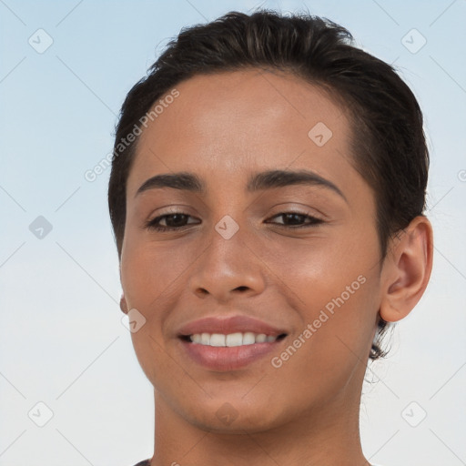 Joyful white young-adult female with short  brown hair and brown eyes