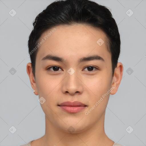 Joyful asian young-adult male with short  brown hair and brown eyes