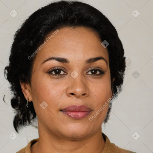 Joyful latino adult female with medium  brown hair and brown eyes