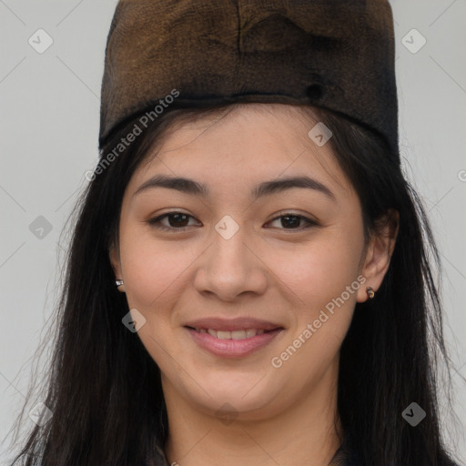 Joyful asian young-adult female with long  brown hair and brown eyes