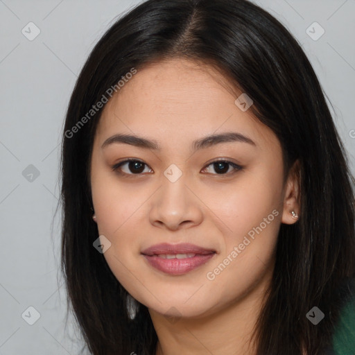 Joyful asian young-adult female with long  brown hair and brown eyes