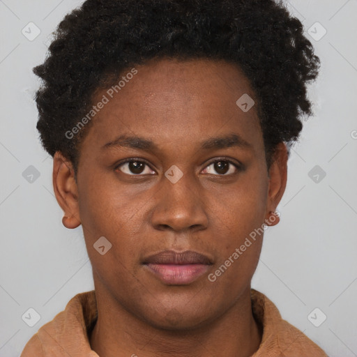 Joyful black young-adult male with short  brown hair and brown eyes