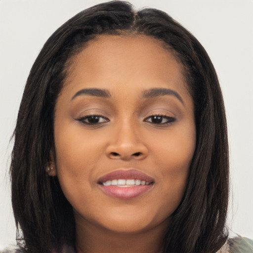 Joyful latino young-adult female with long  brown hair and brown eyes