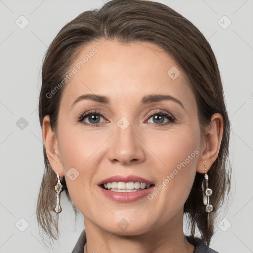 Joyful white young-adult female with medium  brown hair and grey eyes