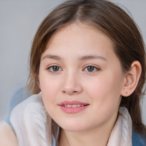 Joyful white child female with medium  brown hair and brown eyes