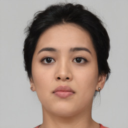 Neutral asian young-adult female with medium  black hair and brown eyes