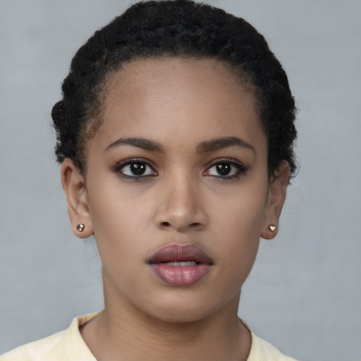Neutral latino young-adult female with short  brown hair and brown eyes