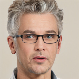 Neutral white middle-aged male with short  gray hair and grey eyes