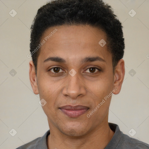 Joyful black adult male with short  black hair and brown eyes