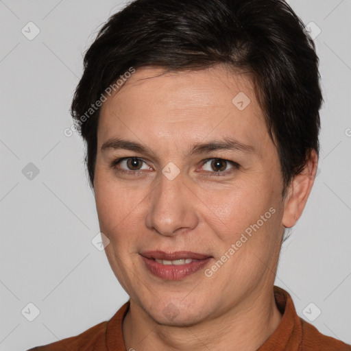 Joyful white adult female with short  brown hair and brown eyes