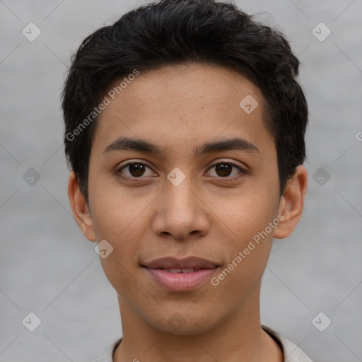 Joyful latino young-adult male with short  brown hair and brown eyes