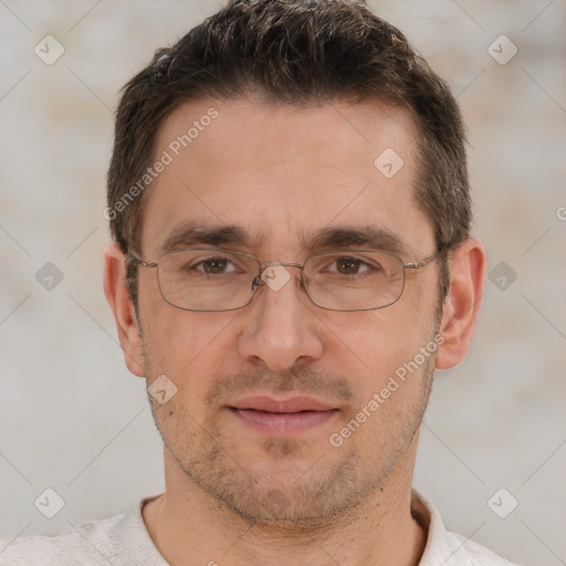 Joyful white adult male with short  brown hair and brown eyes