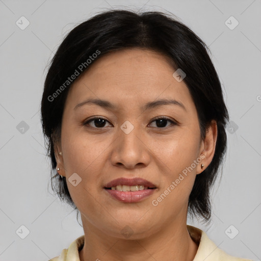 Joyful white adult female with medium  brown hair and brown eyes