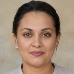 Joyful white adult female with short  brown hair and brown eyes