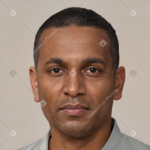 Neutral black adult male with short  black hair and brown eyes