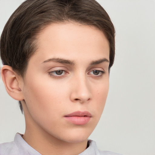 Neutral white young-adult female with short  brown hair and brown eyes