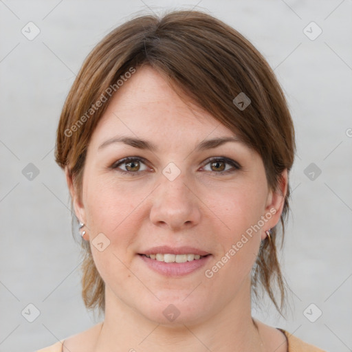 Joyful white young-adult female with medium  brown hair and grey eyes