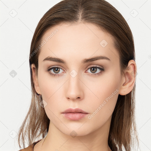 Neutral white young-adult female with long  brown hair and brown eyes