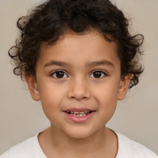 Joyful white child male with medium  brown hair and brown eyes