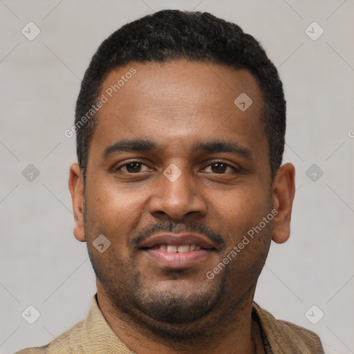 Joyful latino young-adult male with short  black hair and brown eyes