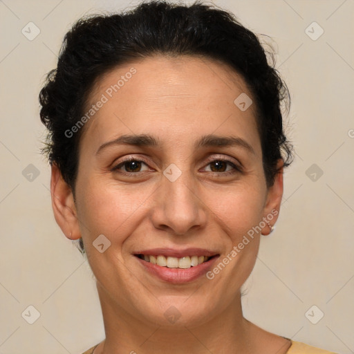 Joyful white adult female with short  brown hair and brown eyes