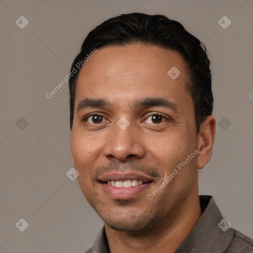 Joyful white young-adult male with short  black hair and brown eyes