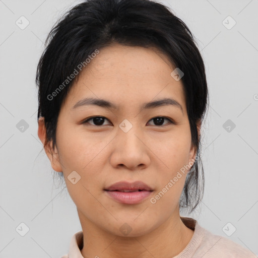 Joyful asian young-adult female with medium  black hair and brown eyes