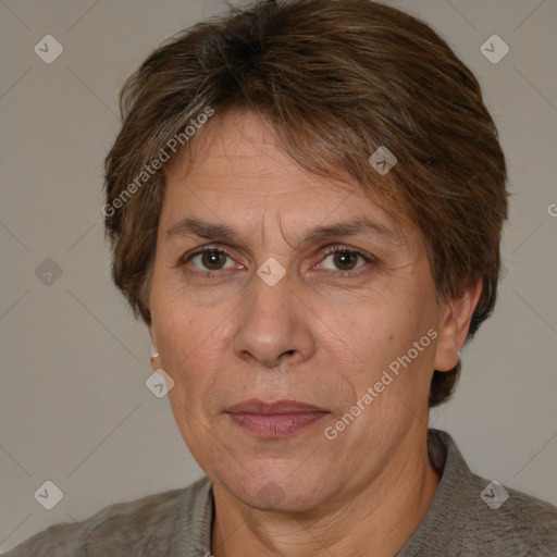 Joyful white adult female with short  brown hair and brown eyes