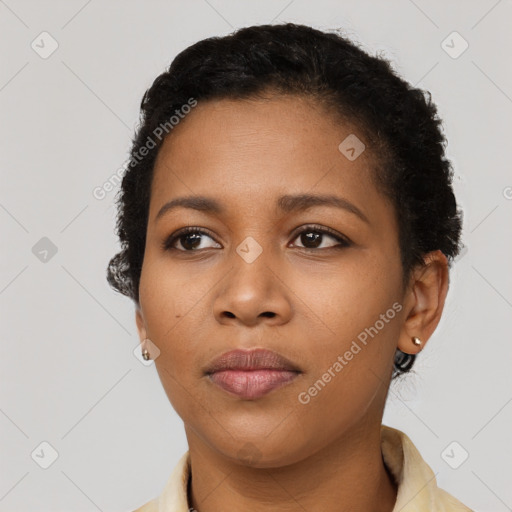 Neutral black young-adult female with short  black hair and brown eyes