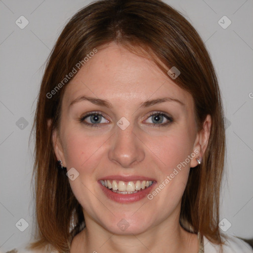 Joyful white young-adult female with medium  brown hair and blue eyes