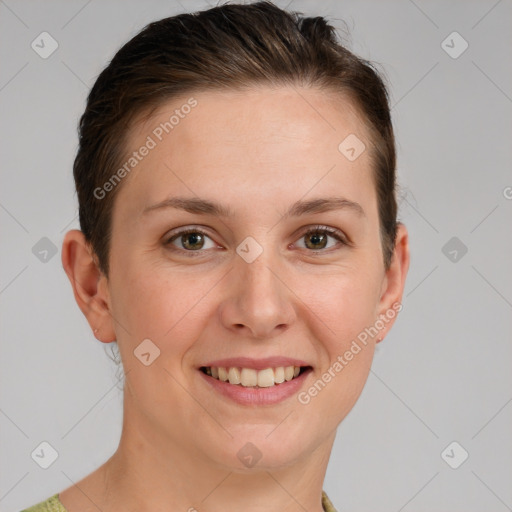 Joyful white young-adult female with short  brown hair and grey eyes