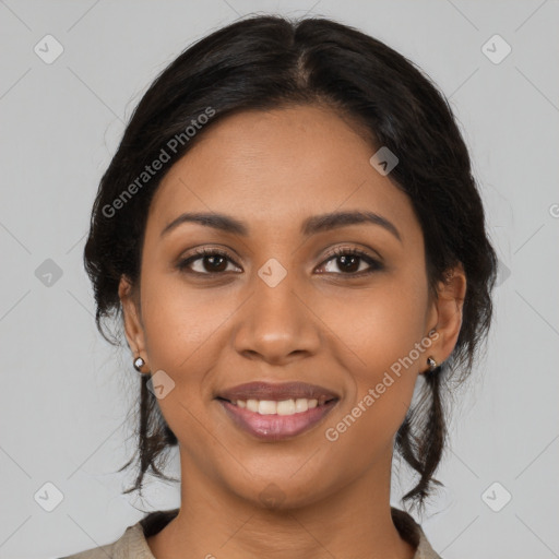 Joyful latino young-adult female with medium  black hair and brown eyes