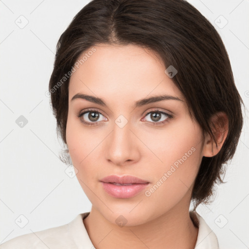 Neutral white young-adult female with medium  brown hair and brown eyes