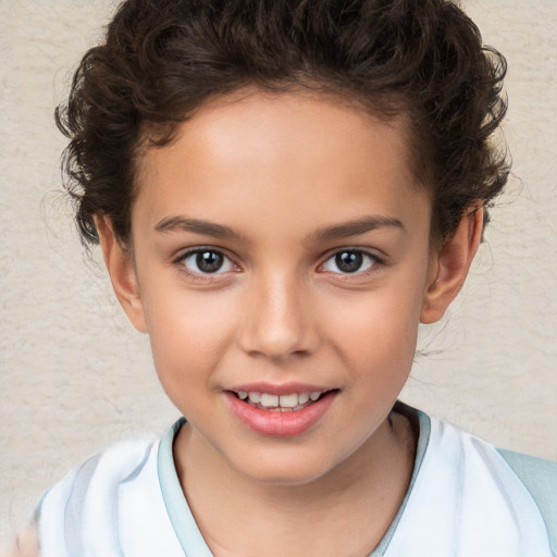 Joyful white child female with short  brown hair and brown eyes