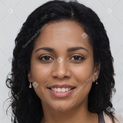 Joyful latino young-adult female with long  brown hair and brown eyes