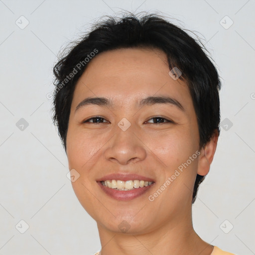 Joyful asian young-adult female with short  brown hair and brown eyes