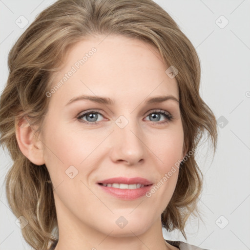 Joyful white young-adult female with medium  brown hair and blue eyes