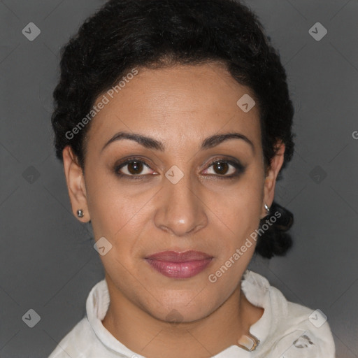Joyful latino young-adult female with short  brown hair and brown eyes