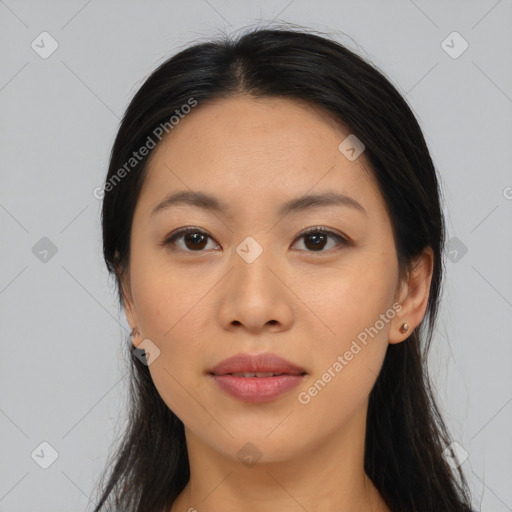 Joyful asian young-adult female with long  black hair and brown eyes