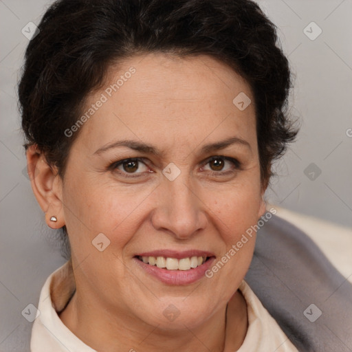 Joyful white adult female with short  brown hair and brown eyes