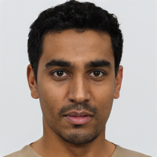 Neutral latino young-adult male with short  black hair and brown eyes