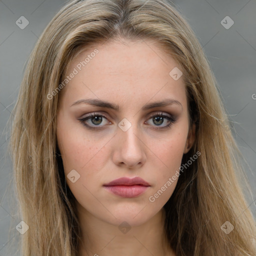 Neutral white young-adult female with long  brown hair and brown eyes