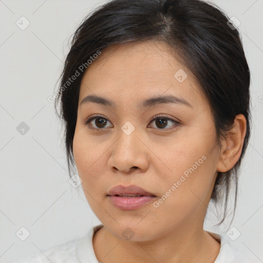 Neutral asian young-adult female with medium  brown hair and brown eyes