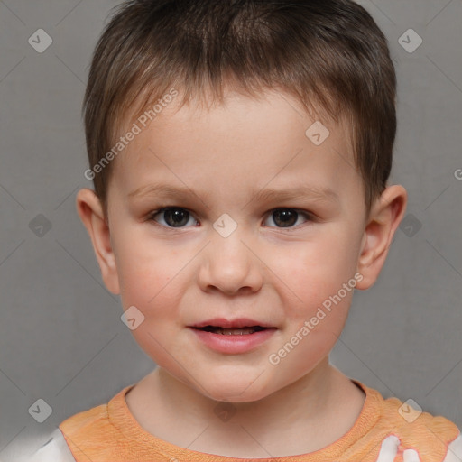 Joyful white child male with short  brown hair and brown eyes