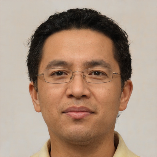 Neutral asian young-adult male with short  brown hair and brown eyes