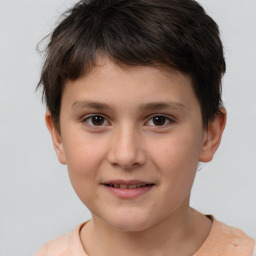 Joyful white child male with short  brown hair and brown eyes