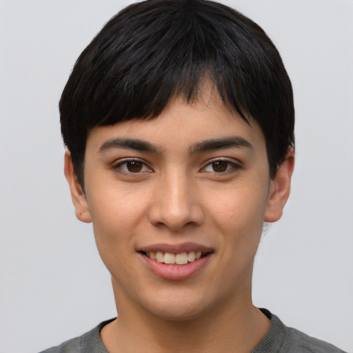 Joyful asian young-adult female with short  black hair and brown eyes