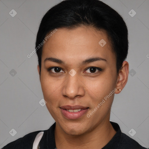 Joyful latino young-adult female with short  brown hair and brown eyes