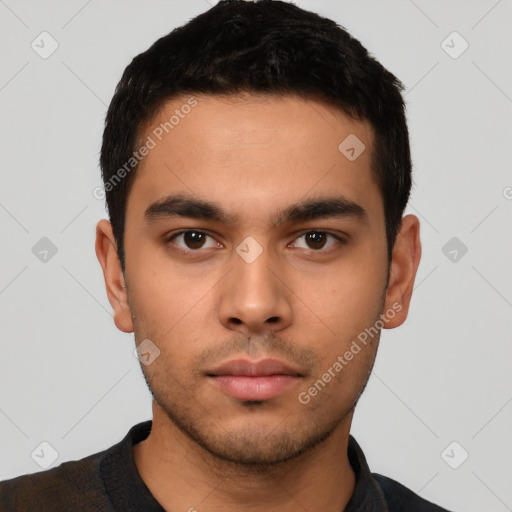 Neutral latino young-adult male with short  black hair and brown eyes