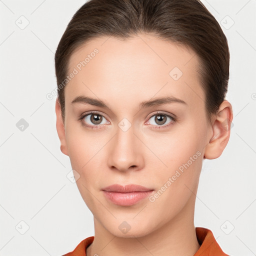 Neutral white young-adult female with short  brown hair and brown eyes